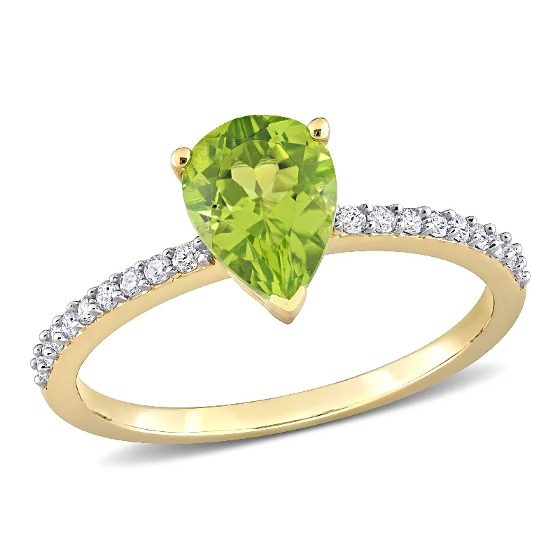 Miadora 1 1/7ct TGW Pear Shape Peridot and 1/7ct TDW Diamond Ring in 14k Yellow Gold