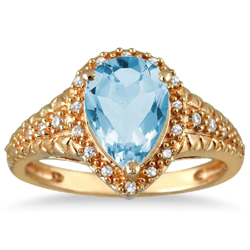 2 Carat Pear Shaped Blue Topaz and Diamond Ring in 10K Yellow Gold