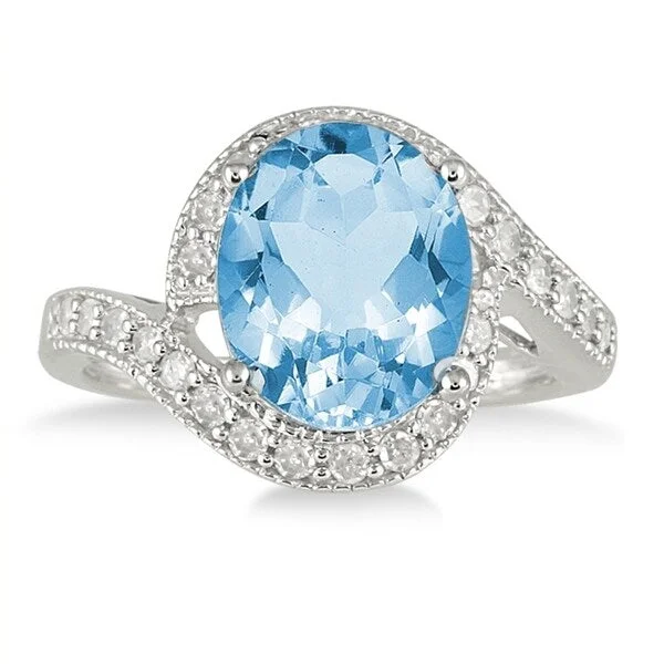 5 Carat Oval Blue Topaz and Diamond Ring in 10K White Gold