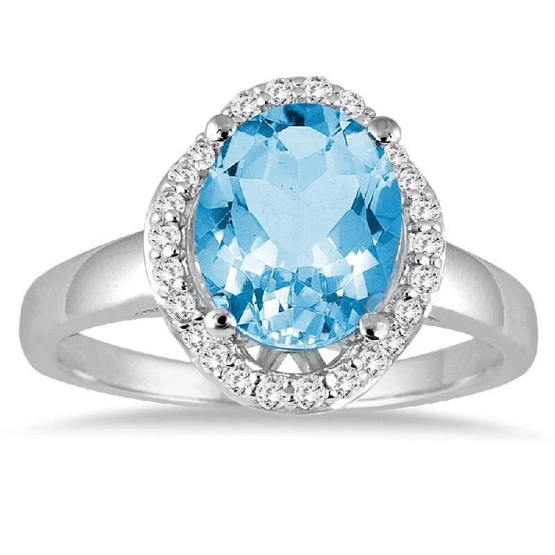 3 1/2 Carat Oval Blue Topaz and Diamond Ring in 14k White gold