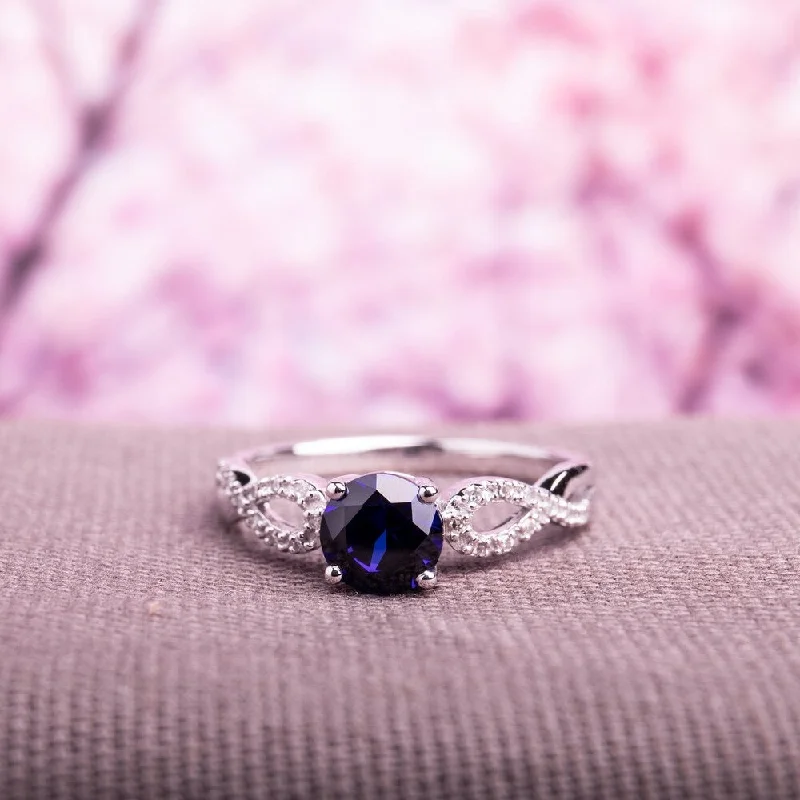 Miadora 10k White Gold Blue Sapphire and 1/10ct TDW Diamond Ring (G-H, I1-I2)